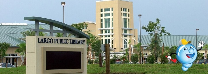 Largo Public Library in Largo, FL with cartoon plumber mascot promoting local plumbing services.